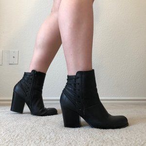 Heeled black booties